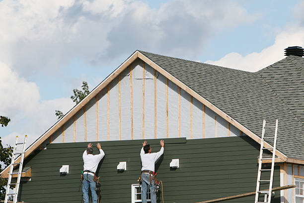 Professional Siding Installation technician working in Hanscom AFB, MA